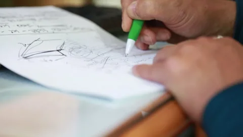 Close up of Businessman Writing Notes with Pen on Paper at Office, Korea Stock Footage 332693586