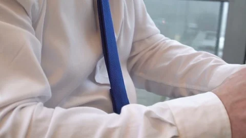 Close up on businessman's hands browsing smartphone, slider shot right 库存影片 73421993