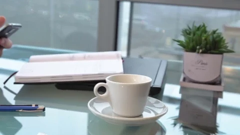 Close up on businessman's hands browsing smartphone, quick slide left and stop Stock Footage