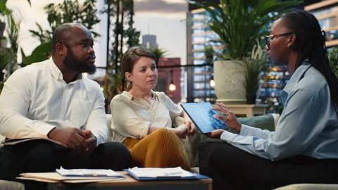 Close up of businesspeople using neural network AI interface on tablet Stock Footage 345165081