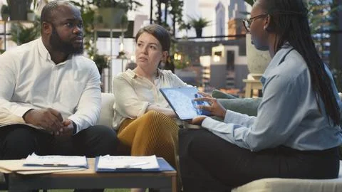 Close up of businesspeople using neural network AI interface on tablet Stock Photos