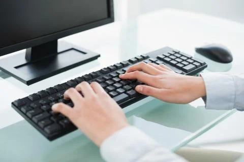 Close up of a businesswoman using a computer Stock Photos