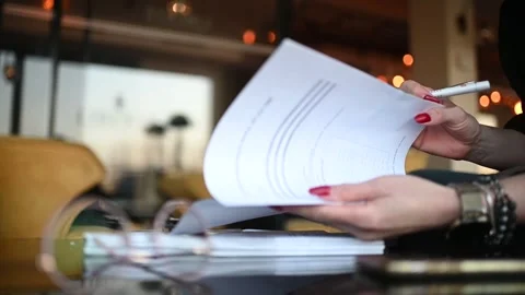 Close up businesswoman's hands with paper documents Stock Footage 267372304