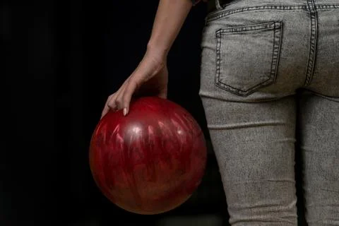 Close-up of a butt next to a bowling ball Stock Photos