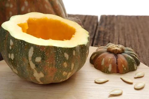 Close up of Butternut squash, pumpkin squash with spices for cooking on wooden Stock Photos