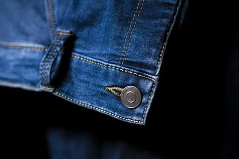 Close-Up of Button and stitching on Blue Jeans, Detailed Denim Design Stock Photos