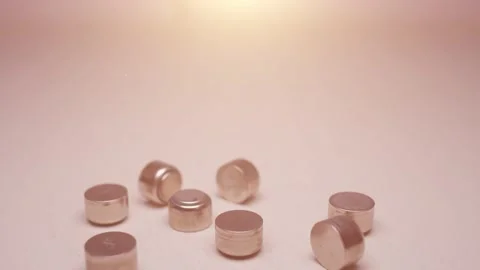 Close up on Button battery. Used in hearing aids. Stock Footage 143808756