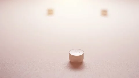 Close up on Button battery. Used in hearing aids. Stock Footage 143814445