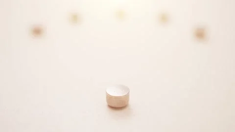 Close up on Button battery. Used in hearing aids. Stock Footage 143814622