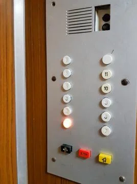 Close-up of the button panel in the old elevator, vertical frame Stockfoto's
