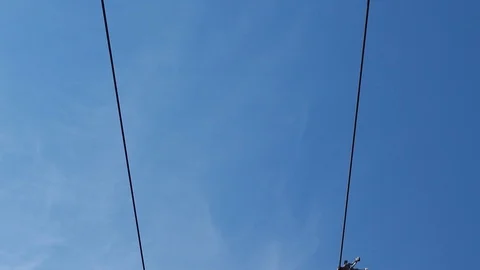 Close up of cableway in the blue sky . 2 Stock Footage 129822241