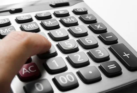 Close up calculator with finger Stock Photos