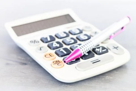 Close up calculator with pen Stock Photos