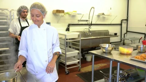 Close call with boiling water in a kitchen. Stock Footage 105805177
