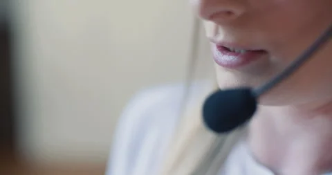 Close-up of call center worker convincing client to buy Stock Footage 304926132