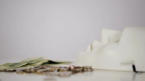 Close-up. The camera alternately focuses on objects lying on a white table. On Stock Footage 276572245