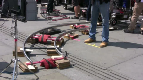 Close up of a camera dolly track being used on a film set 動画素材 25036641