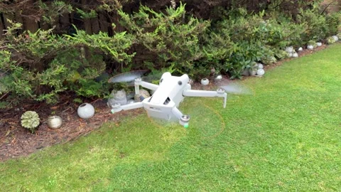 Close Up Camera Drone Hovering in Flight with Quadcopter Propellers and Stock-Footage 345170430