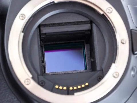 Close-up of a camera with exposed image sensor in studio setting Stock Photos