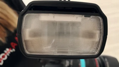 Close up. Camera flash. Firing. Concept creative industry. Stockbeeldmateriaal 125928786