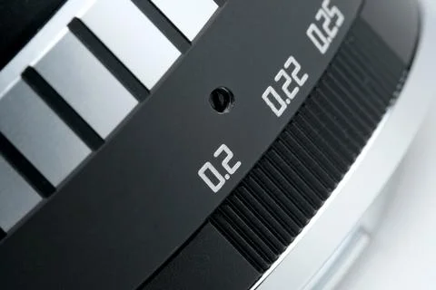 Close-up of a camera lens aperture dial in focus Stock Photos