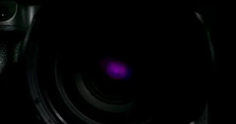Close up of Camera Lens with Artistic Light Reflections in 4K Stock Footage 284040819
