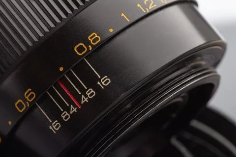 Close-up of camera lens with engraved focus markings Stock Photos