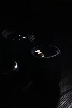 Close-Up of Camera Lenses in Low Light: Professional Photography Equipment Stock Photos
