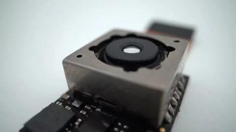 Close up on a camera module for mobile phone. Closeup of Smartphone Lens Stock Footage 164174679