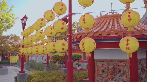 A close-up camera move take of walking along lanterns of a temple in Taiwan. Stock Footage 140249556