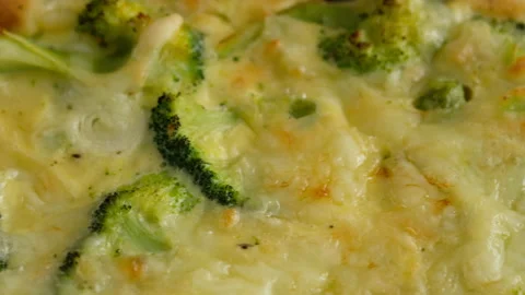 Close-up camera movement. Frittata with broccoli on the plate. Italian breakfast Video stock 146922712