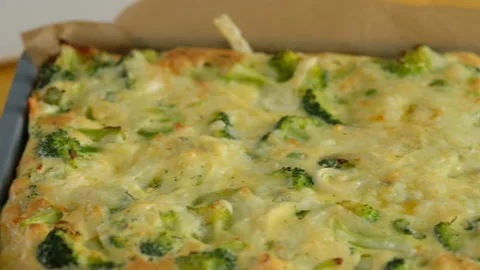 Close-up camera movement. Frittata with broccoli in a baking dish. Italian Video stock 152486663