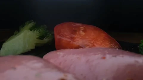 Close-up camera slowly moving between vegetables and raw chicken,healthy food Stock Footage 131609155
