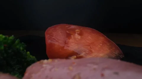 Close-up camera slowly moving between water splash vegetables and raw chicken, Stock Footage 131609621