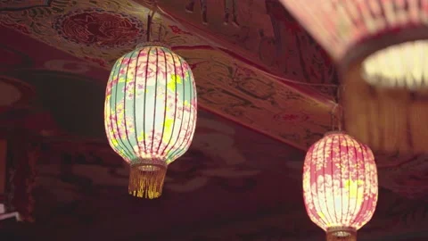A close-up camera take of colorful lanterns with flowers pattern on. Stock Footage 140262974