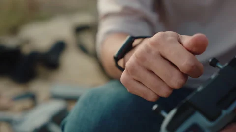 Close up of a cameraman holding a drone controller,screw joystick. medium shot Stock Footage 252671092