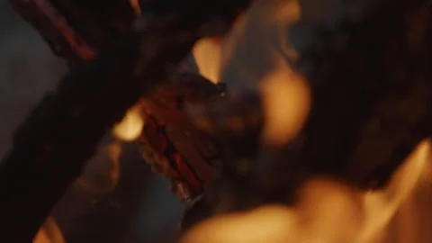 Close up camp fire flames and logs in slowmotion on RED Stock Footage 174075561