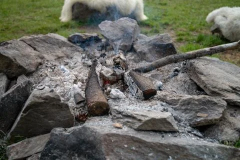 Close up of Camp fire made of stone ring, traditional, authentic Stock Photos