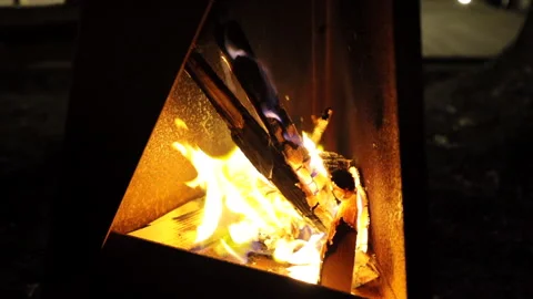 Close-up of campfire flames burning in the night. Full HD. Stock Footage 328629384