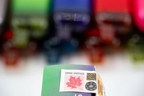 Close up of Canadian vaping excise stamp on disposable vape. Toronto, Canada - Stock Photos