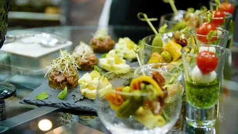Close-up of canapes on the buffet table. Buffet food in a restaurant. Stock Footage 277279969