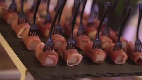 Close-up of canapes decorated with a black fork Stock-Footage 171995287
