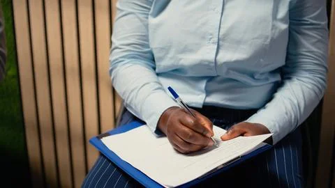 Close up of candidate filling in registration forms for job application Stock Photos