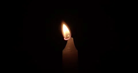 Close up of Candle Being Lit Against a Black Background Stock-Footage 331851409