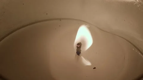 Close Up Candle Burning and Being Blown Out Stock Footage 170994636