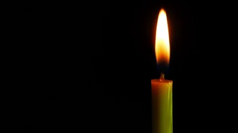 Close up candle is burning on black background. Stock Footage 80807863