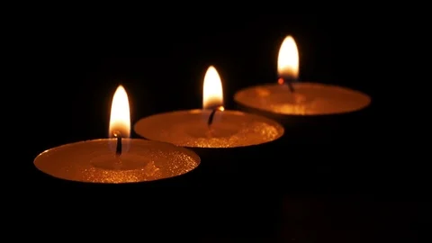 Close up candle is burning on black background. Stock Footage 80809183
