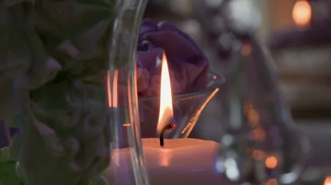 Close-up of candle flame on glass backdrop Stock Footage 43965066