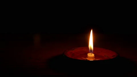 Close up candle flame Isolated on dark Background. Video stock 151870415