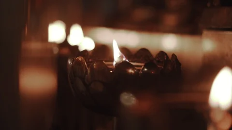 Close-Up of Candle Light Flame in Buddhist Temple Buddhism Stock Footage 104622088